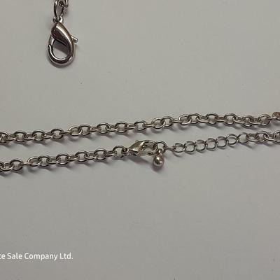 Two Pendants - Lia Sophia - gold toned fashion pin - and set of earrings.