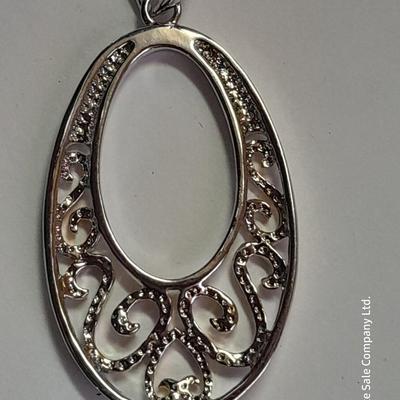 Two Pendants - Lia Sophia - gold toned fashion pin - and set of earrings.