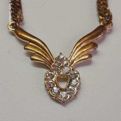 Gold toned rhinestone necklace with matching earrings- Plunder earrings and a Bling ball pendant necklace.