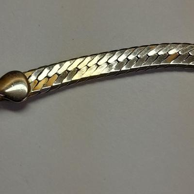 Two fun and fancy silver toned necklaces - chains