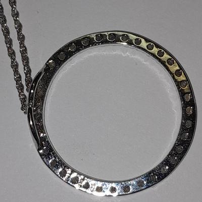 Two silver-toned necklaces with Rhinestone pendants