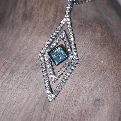 Two silver-toned necklaces with Rhinestone pendants