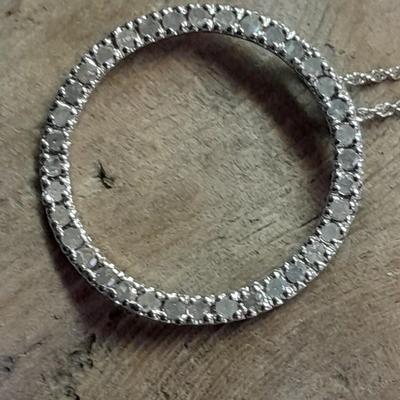 Two silver-toned necklaces with Rhinestone pendants