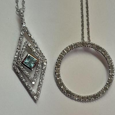 Two silver-toned necklaces with Rhinestone pendants