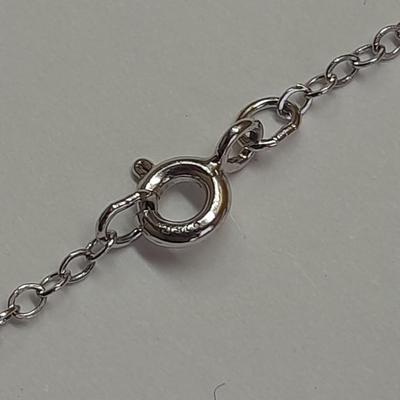 Two silver-toned necklaces with Rhinestone pendants