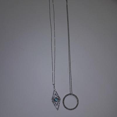 Two silver-toned necklaces with Rhinestone pendants