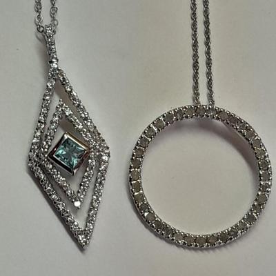 Two silver-toned necklaces with Rhinestone pendants
