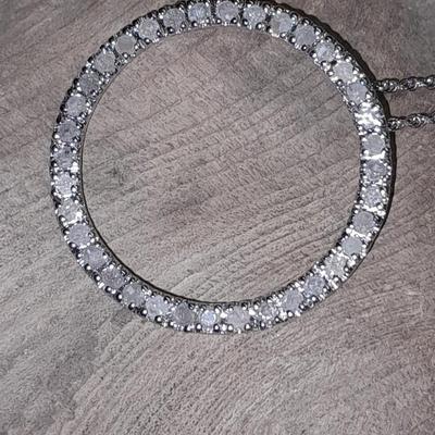 Two silver-toned necklaces with Rhinestone pendants