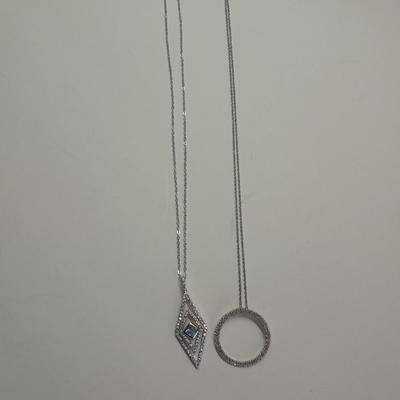 Two silver-toned necklaces with Rhinestone pendants