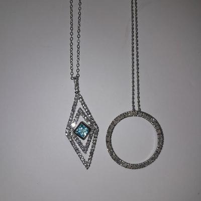 Two silver-toned necklaces with Rhinestone pendants