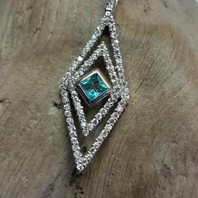 Two silver-toned necklaces with Rhinestone pendants