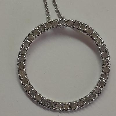 Two silver-toned necklaces with Rhinestone pendants