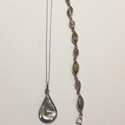 Abalone teardrop marked necklace with a nice bracelet.