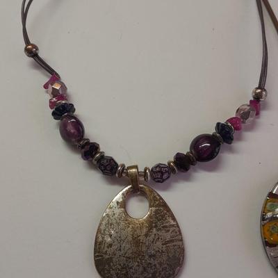 Two Necklaces one with beautiful glass pendant