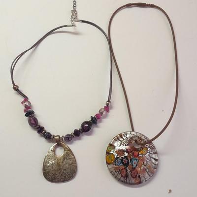 Two Necklaces one with beautiful glass pendant
