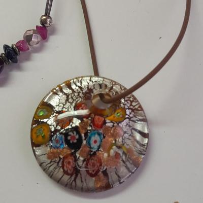 Two Necklaces one with beautiful glass pendant