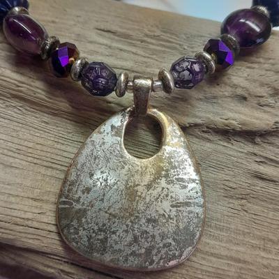 Two Necklaces one with beautiful glass pendant