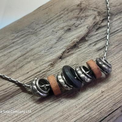 Beaded necklaces and a couple silver toned bracelets.