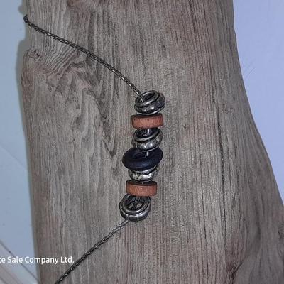 Beaded necklaces and a couple silver toned bracelets.