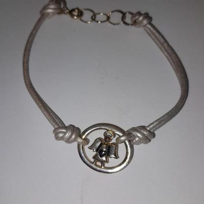 Beaded necklaces and a couple silver toned bracelets.