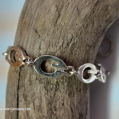 Beaded necklaces and a couple silver toned bracelets.