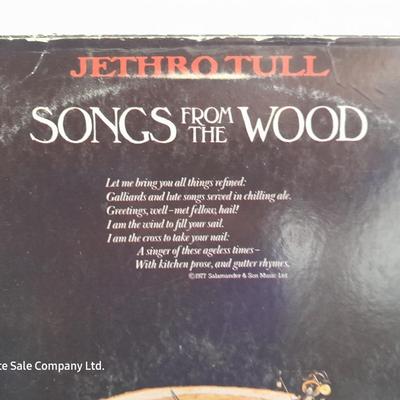 An assortment of collectibles - Jethro Tull Lp = Poster - and books