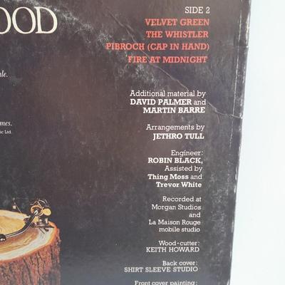 An assortment of collectibles - Jethro Tull Lp = Poster - and books