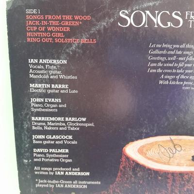 An assortment of collectibles - Jethro Tull Lp = Poster - and books