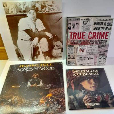 An assortment of collectibles - Jethro Tull Lp = Poster - and books
