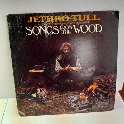 An assortment of collectibles - Jethro Tull Lp = Poster - and books