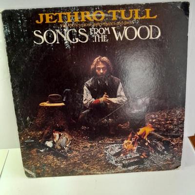 An assortment of collectibles - Jethro Tull Lp = Poster - and books
