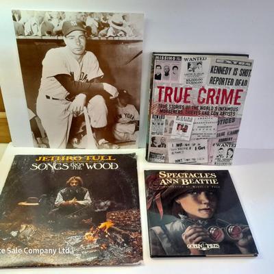 An assortment of collectibles - Jethro Tull Lp = Poster - and books