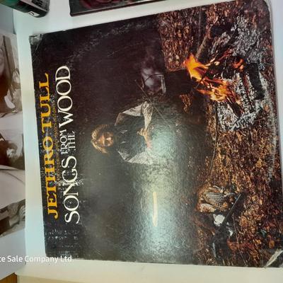 An assortment of collectibles - Jethro Tull Lp = Poster - and books