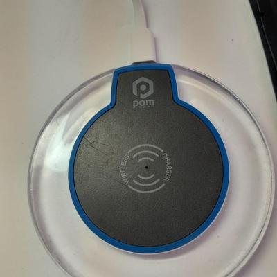 Digital food scale - POM Gear Phone charger - and a few smart stash brand bags.