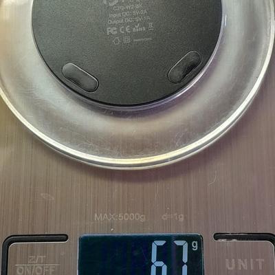 Digital food scale - POM Gear Phone charger - and a few smart stash brand bags.