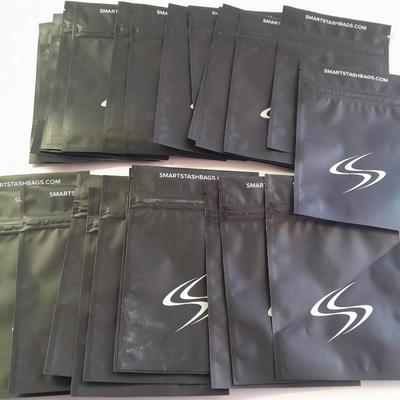 Digital food scale - POM Gear Phone charger - and a few smart stash brand bags.