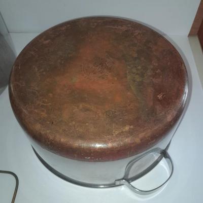 Rever ware stainless pot with larger stock pot and a metal bowl-hung cheese grater