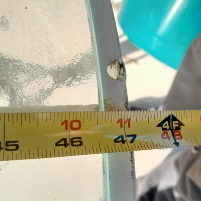 47" Glass topped metal frame patio table