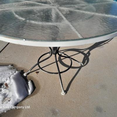47" Glass topped metal frame patio table