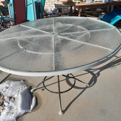 47" Glass topped metal frame patio table
