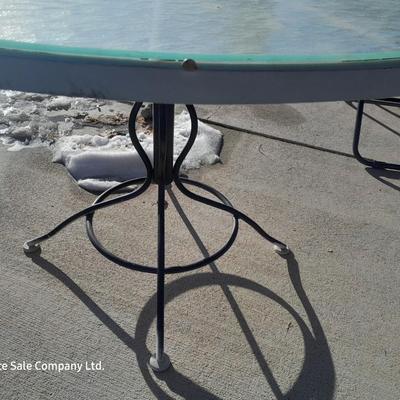 47" Glass topped metal frame patio table