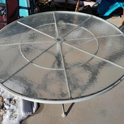 47" Glass topped metal frame patio table