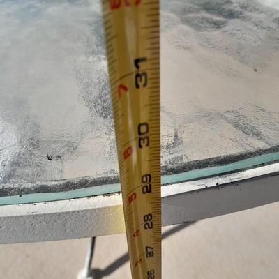 47" Glass topped metal frame patio table