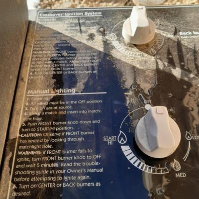 Weber propane grill with 2 propane bottles