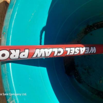 Rope handled barrel with new Fox farm potting soil, weed claw, and other gardening items