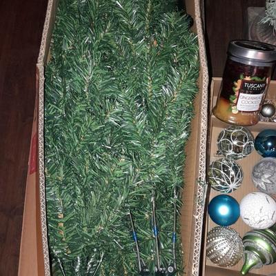 Two faux Christmas trees - ornaments and two candles