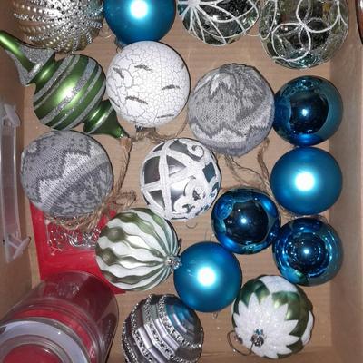 Two faux Christmas trees - ornaments and two candles