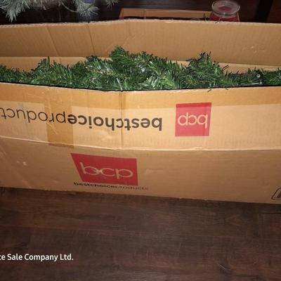 Two faux Christmas trees - ornaments and two candles