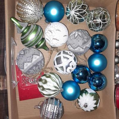 Two faux Christmas trees - ornaments and two candles