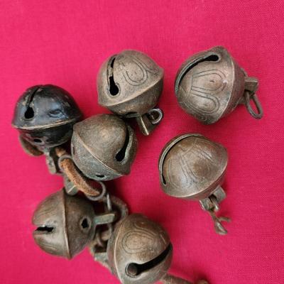 Lot of primitives Brass Bells , Cast Iron General Store Teine Holder, Cabbage Cutter